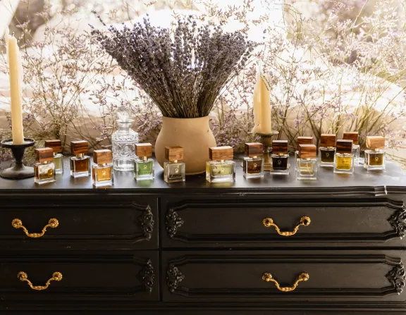 An assortment of Manoli perfumes on the table